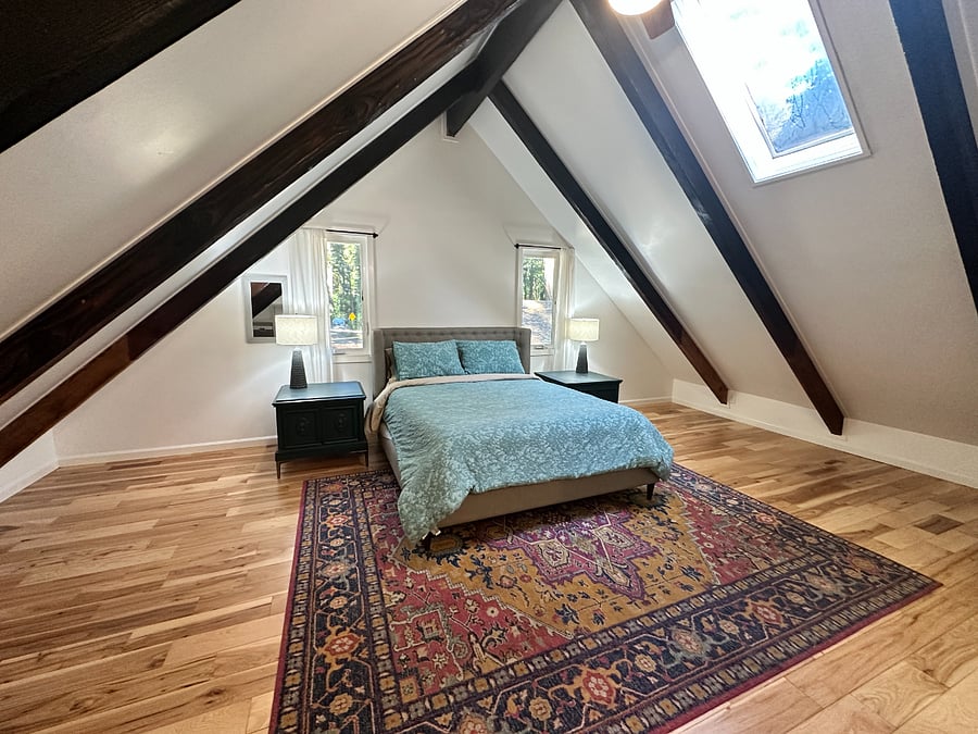 Bedroom 1 (of 4) with queen sized bed and en suite bathroom. This bedroom is located on the second level. 