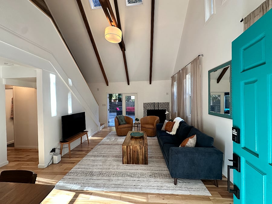Living room with vaulted ceilings and gas fireplace