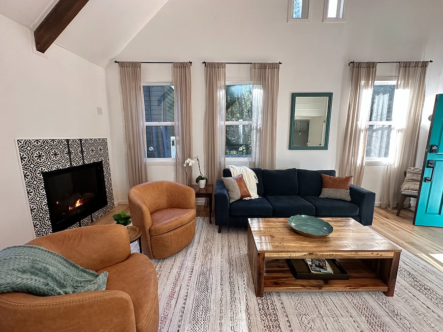 Living room with vaulted ceilings and gas fireplace