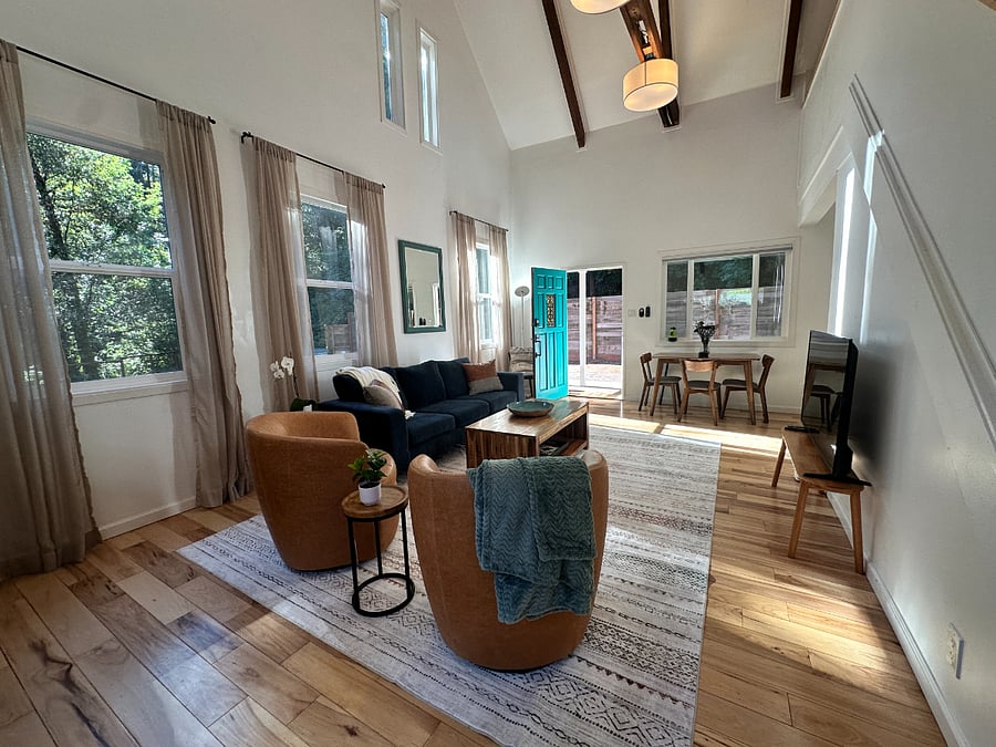 Living room with vaulted ceilings and gas fireplace