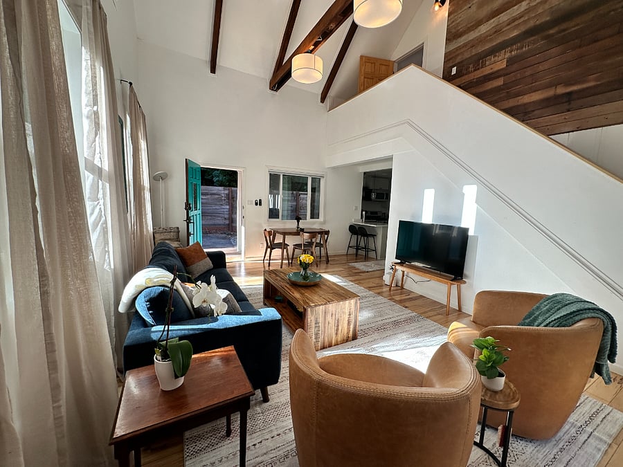 Living room with vaulted ceilings and gas fireplace