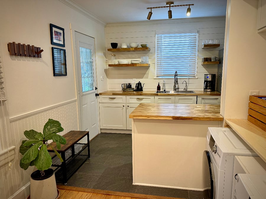 View from laundry area back into kitchen/back door