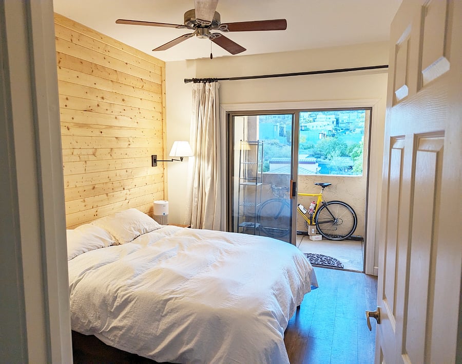 Bedroom with adjoining balcony and walk-in closet