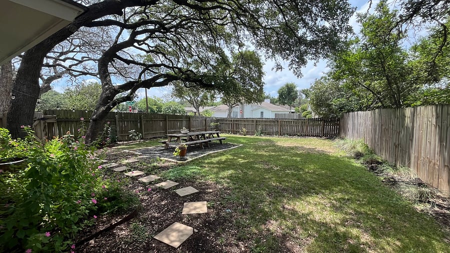Backyard with two picnic tables