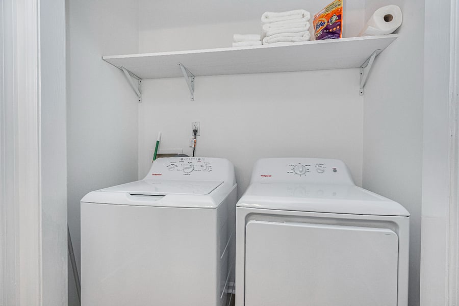 Laundry area inside hall bath