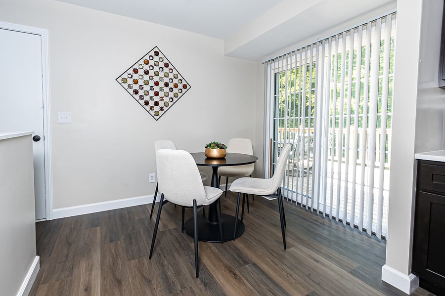 Dining Room with sliding doors that open to the huge Deck overlooking the backyard