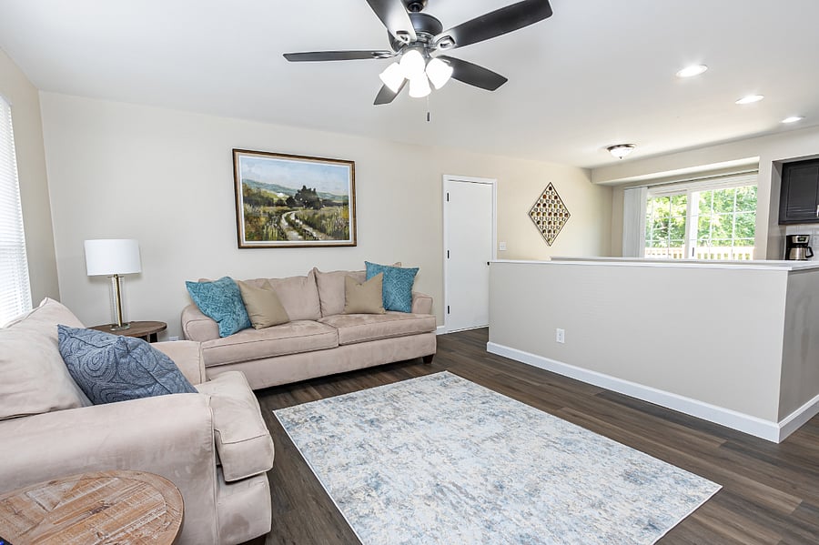 Living Room opens to Dining Room and Kitchen.