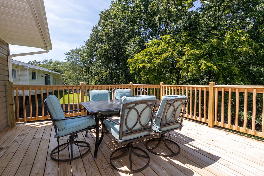 Huge Deck overlooks the trees and backyard