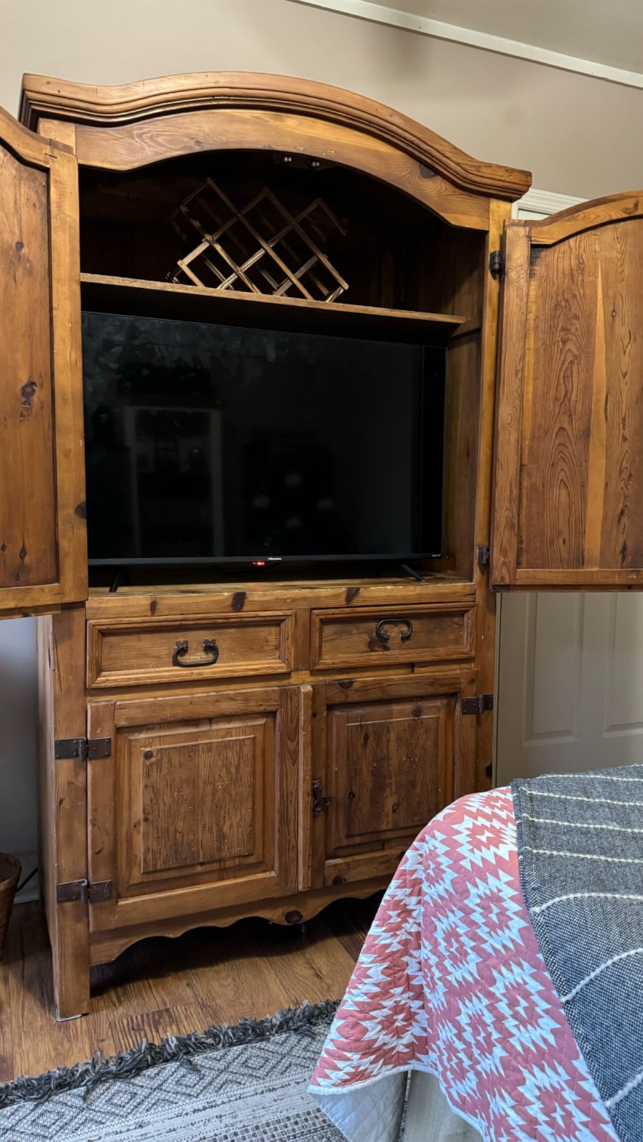 Smart Tv, wine rack and storage unit.