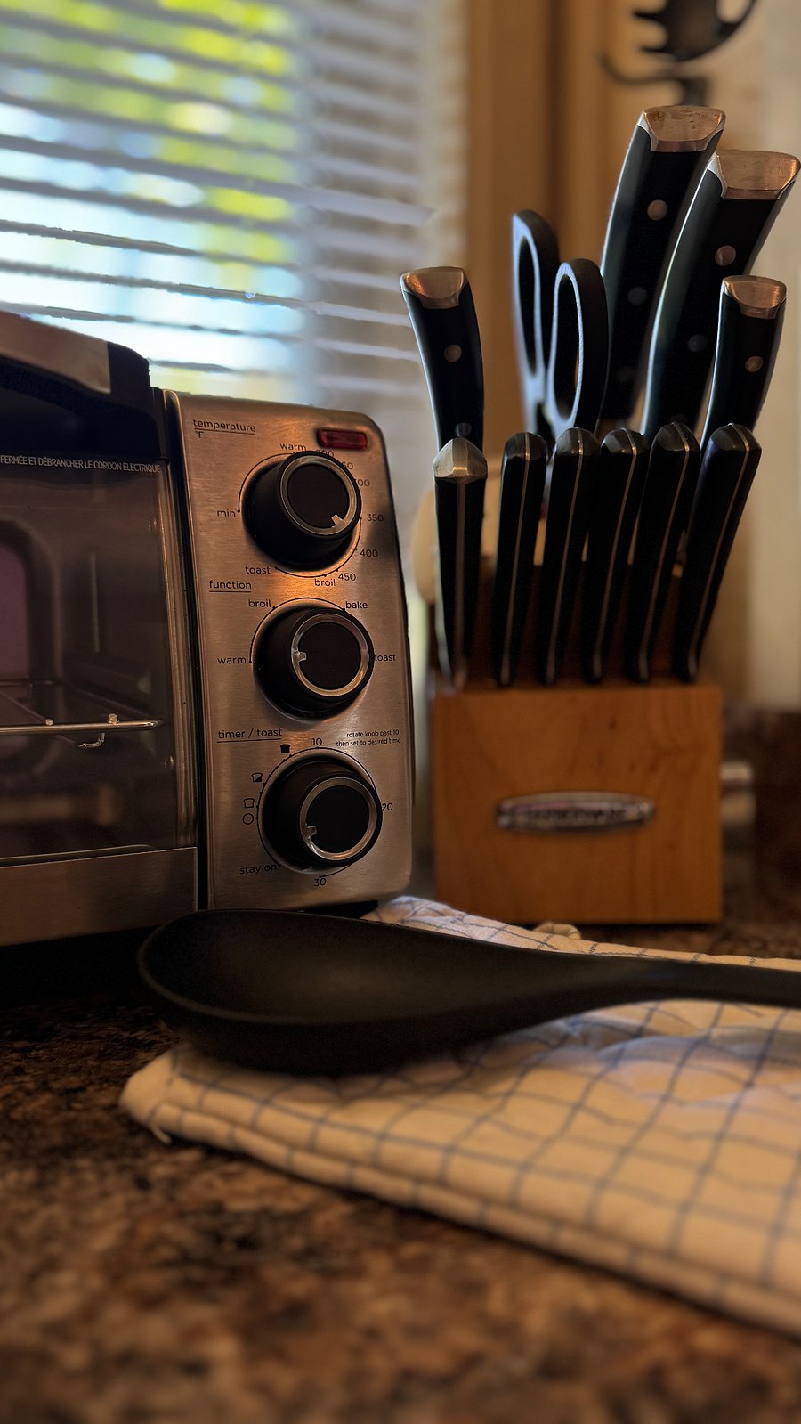 Toaster oven and knives.