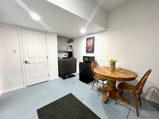 STORAGE CLOSET.
CABINETS TO STORE FOOD.
MINI-FRIDGE AND MICROWAVE.