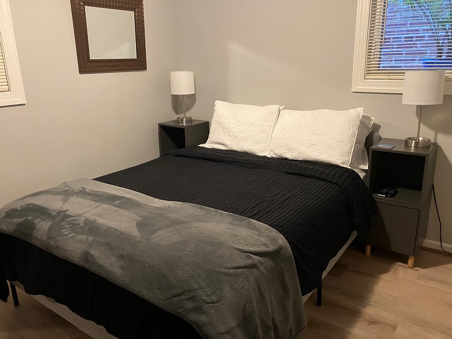 Bedroom 1: Queen bed with large closet across from the bed (not shown).