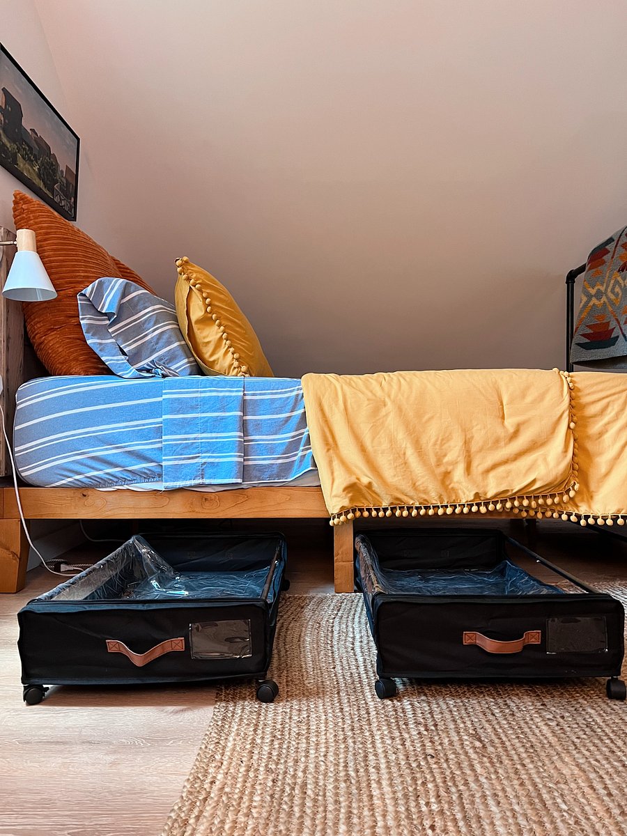 Additional storage wheels out of the way and under the bed.