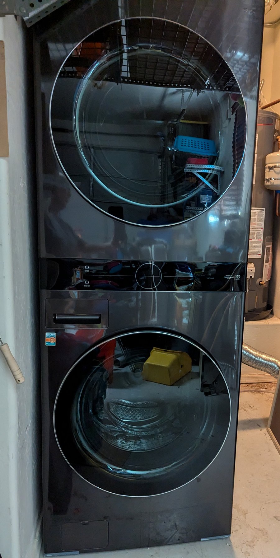 Stacked washer and dryer in garage