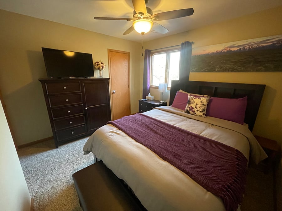 Queen bedroom with closet locked for owner storage