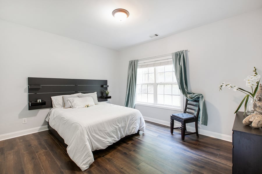 Brand new, queen-sized bed. 6 drawers of storage built in underneath bed. Storage built into headboard for books, your phone or anything you want. Blackout curtains. Overlooking back yard. Smart TV. Closet and armoire included.