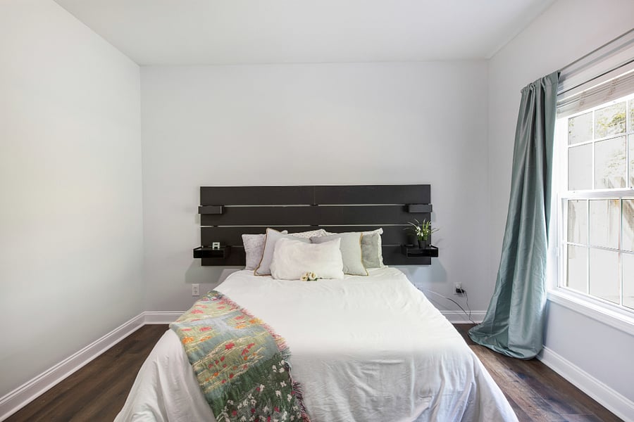 Bedroom #1 - Brand new, queen-sized bed. 6 drawers of storage built in underneath bed. Storage built into headboard for books, your phone or anything you want. Blackout curtains. Overlooking back yard. Smart TV. Closet and armoire.