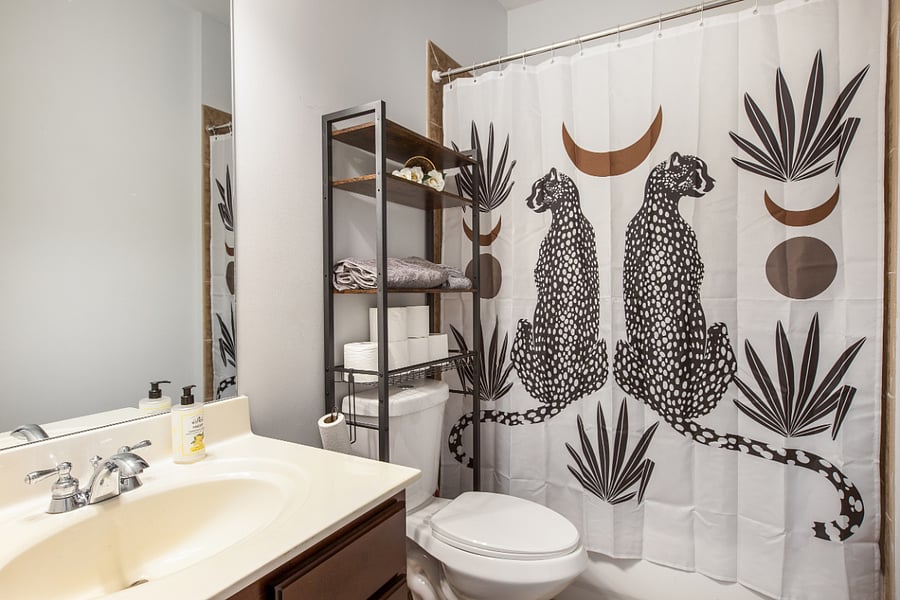 Your private bathroom (Bedroom #1). New toilet! Fresh towels, washcloths and starter toiletries. Good storage.