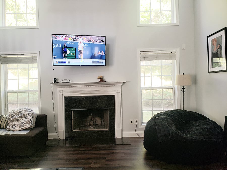Common area: Spacious, yet cozy living room/ great room. Smart TV, wood-burning fireplace and lots of light.
