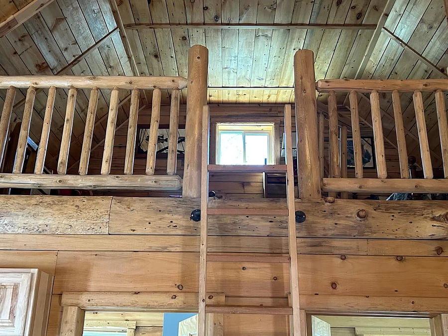 ladder-access loft: desk, two twin beds