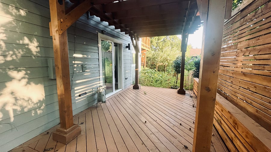 Private outdoor deck space. Mostly, but not completely fenced in.