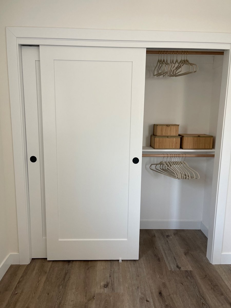 Closet with 2 bars, 2 shelves and storage containers
