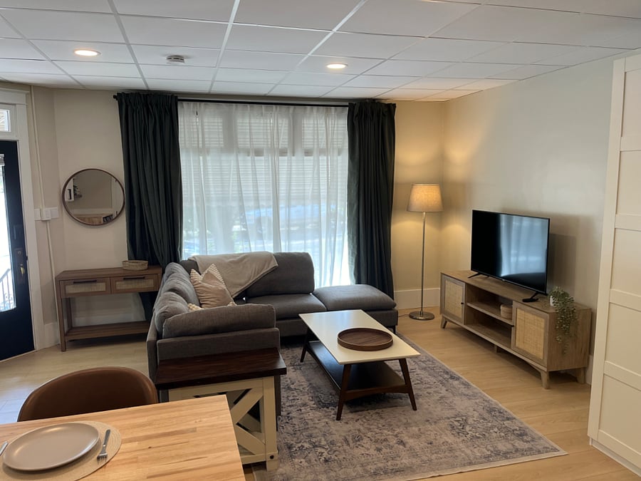 Living room. Lots of natural light, but with room darkening shades when you dont want it.