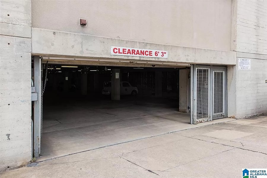 Secured garage gate entrance (back of building)