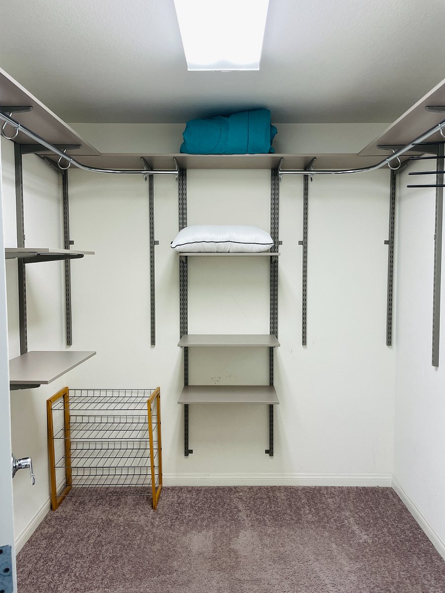 3rd Floor Walk in Closet: everything you need and plenty of storage/racks