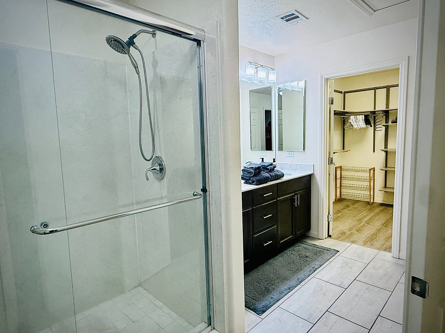 3rd Floor Master Bath: dual sinks & walk-in shower plus walk-in closet