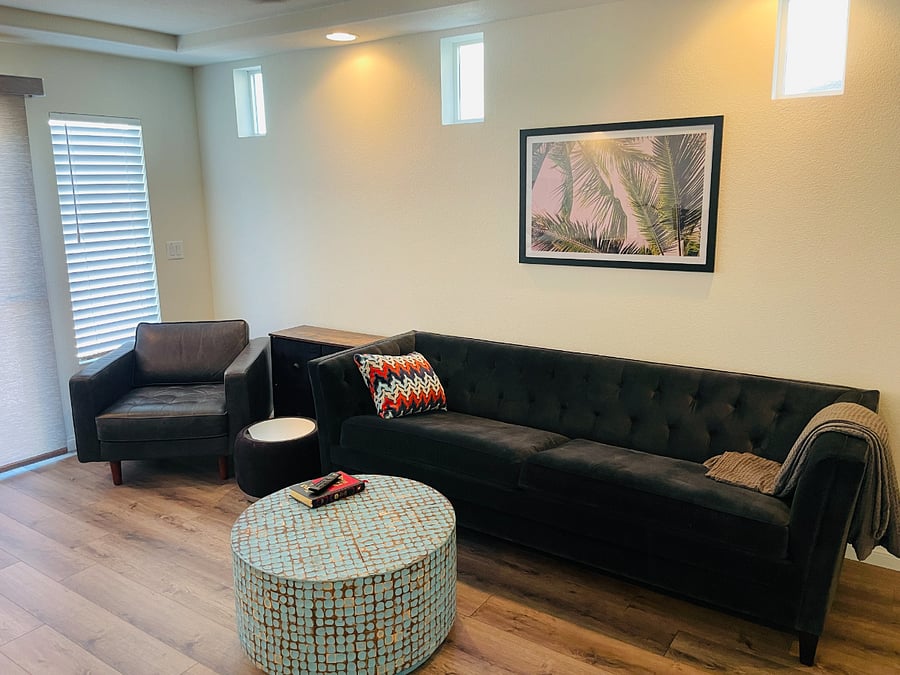 Relax in your beautiful living room. This is like your typical hotel suite.