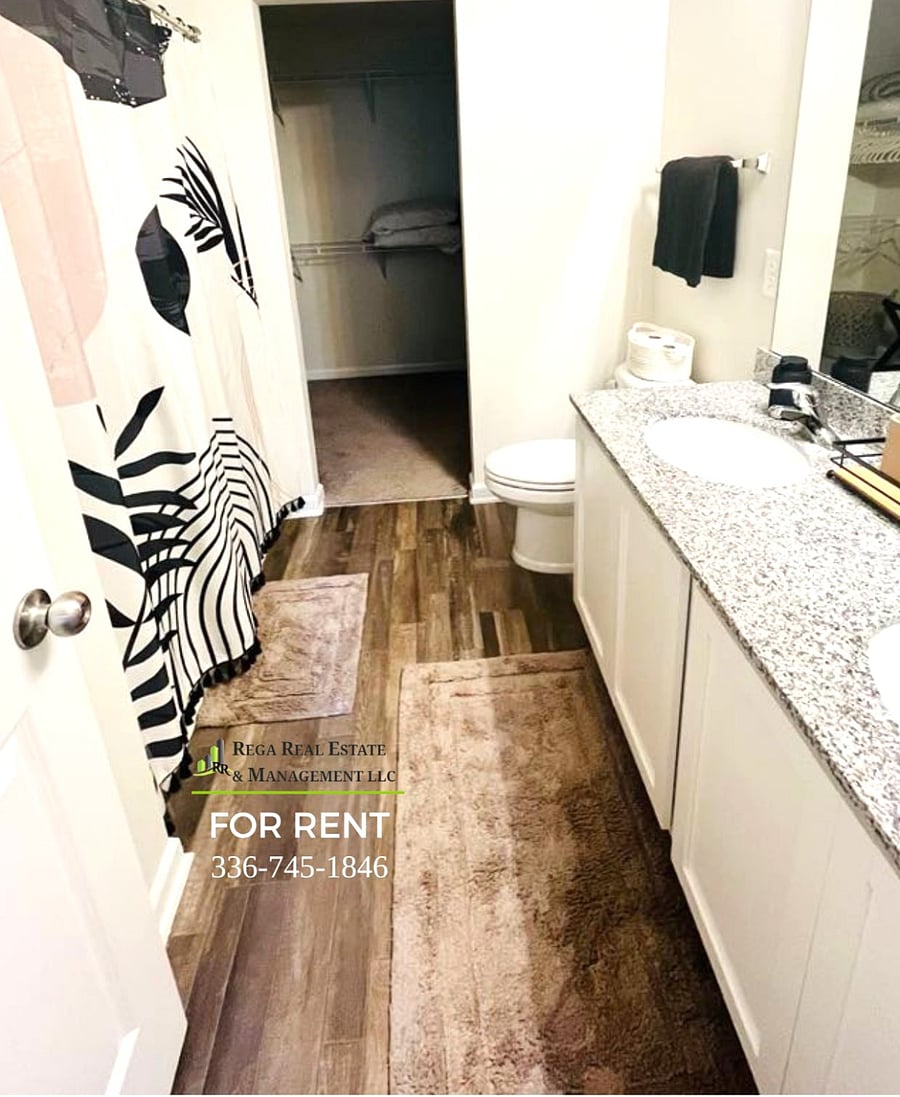 En-suite Bathroom with double sinks - Large Walk in Closet.