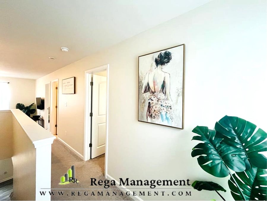 Upstairs had all three bedrooms - 2 Full baths and a sitting/lounge area w/ TV