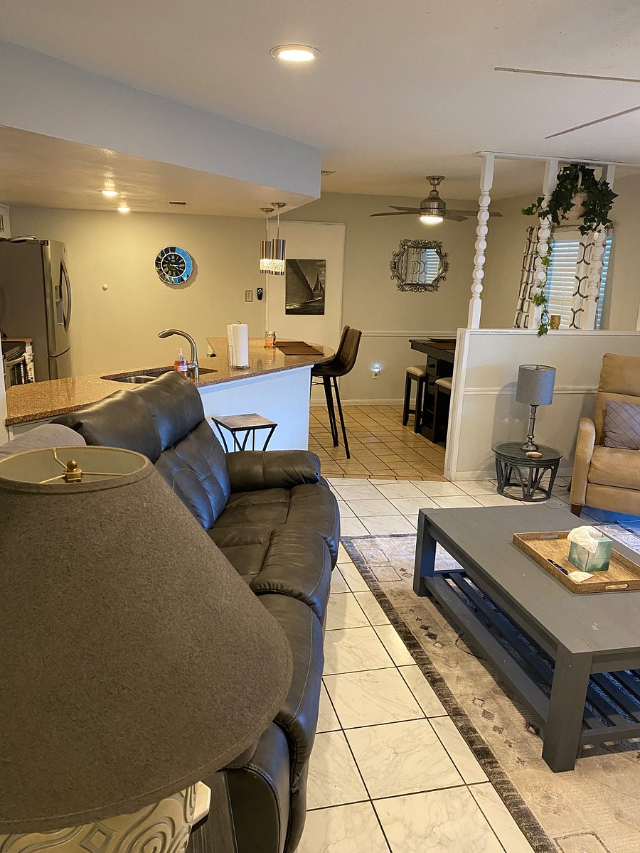 Living room and view of kitchen and dining  room