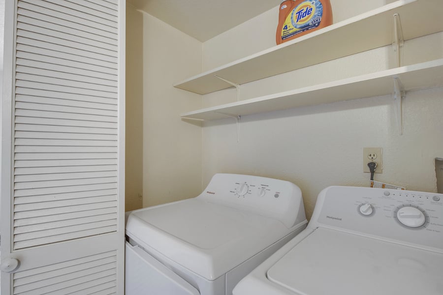Laundry closet with washer and dryer