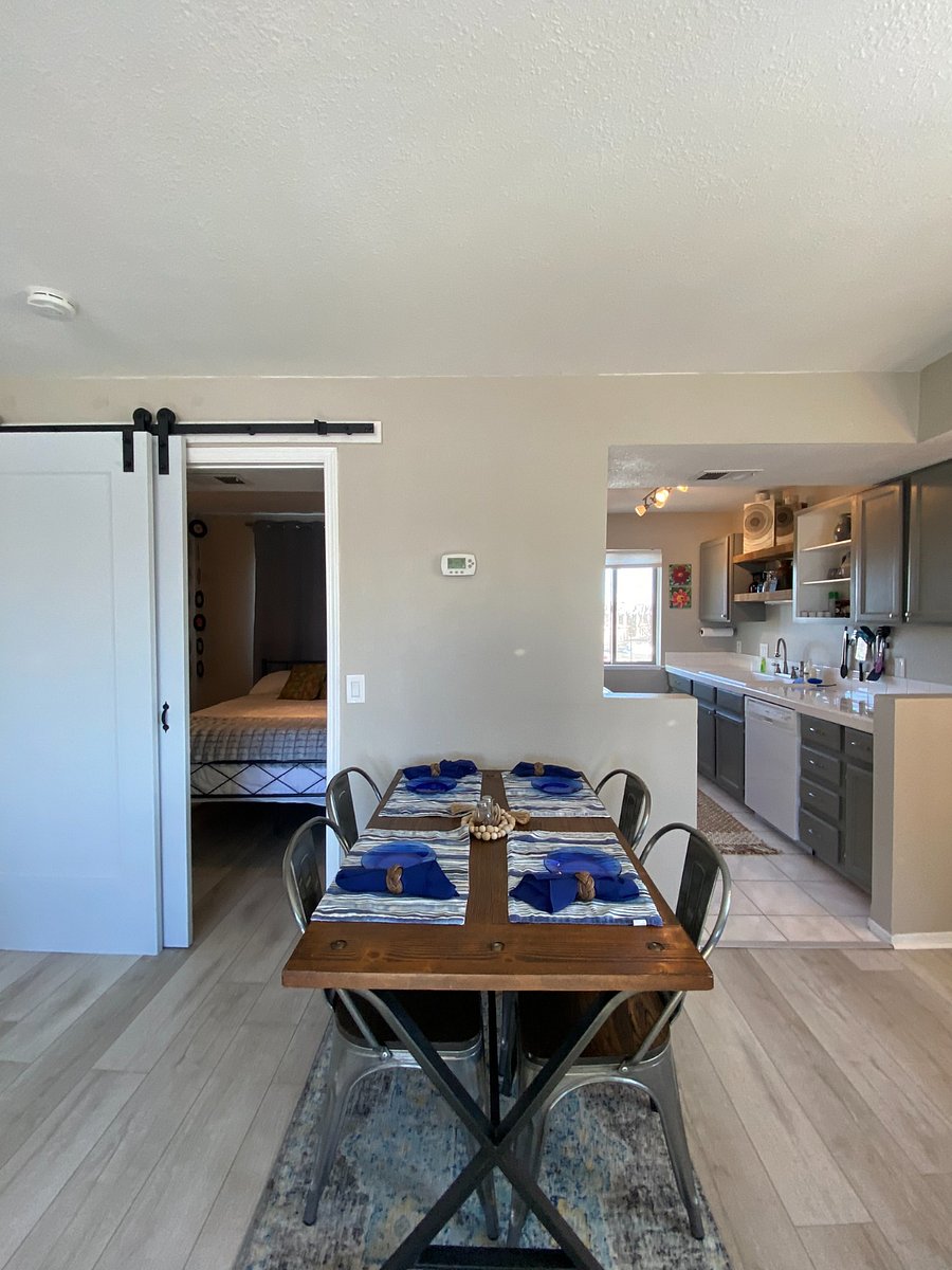 Interior dining, queen bedroom & kitchen.
