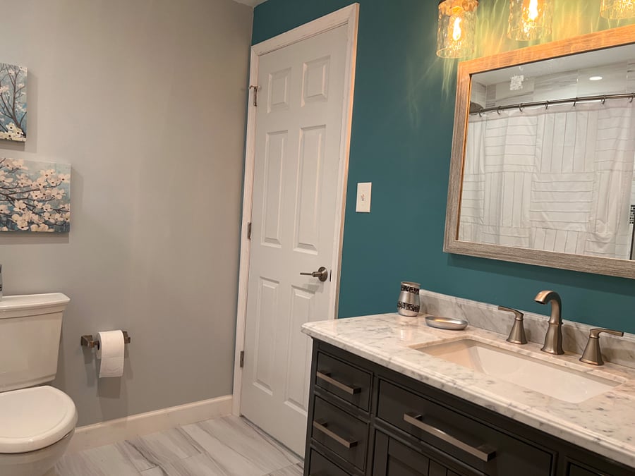 Standing in the bathroom, looking toward the bedroom door