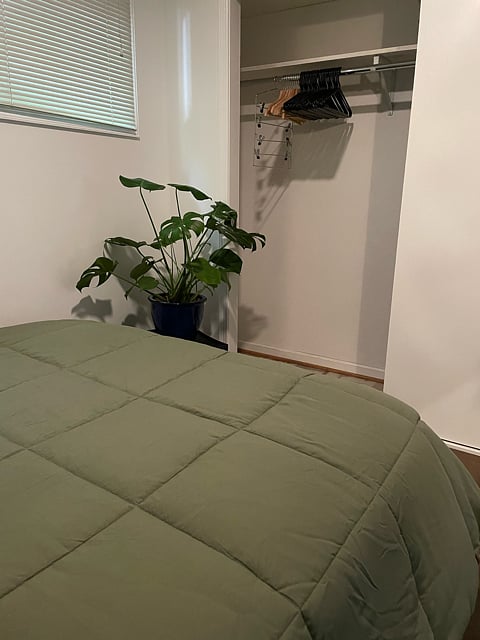 Full-sized clothes closet with hangers; ironing board, iron, and steamer available upon request