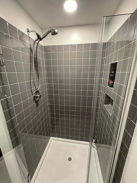 Roomy shower w/excellent water pressure; liquid bath soap and shampoo/conditioner provided