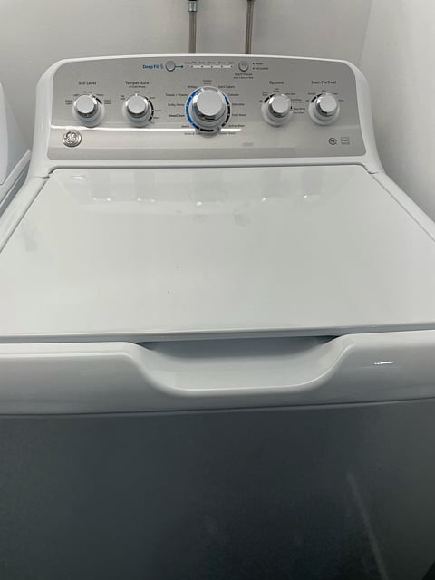 Brand new GE washer/driyer set; washer is a top-loading, high-efficiency (HE) uses less water, soap, and energy