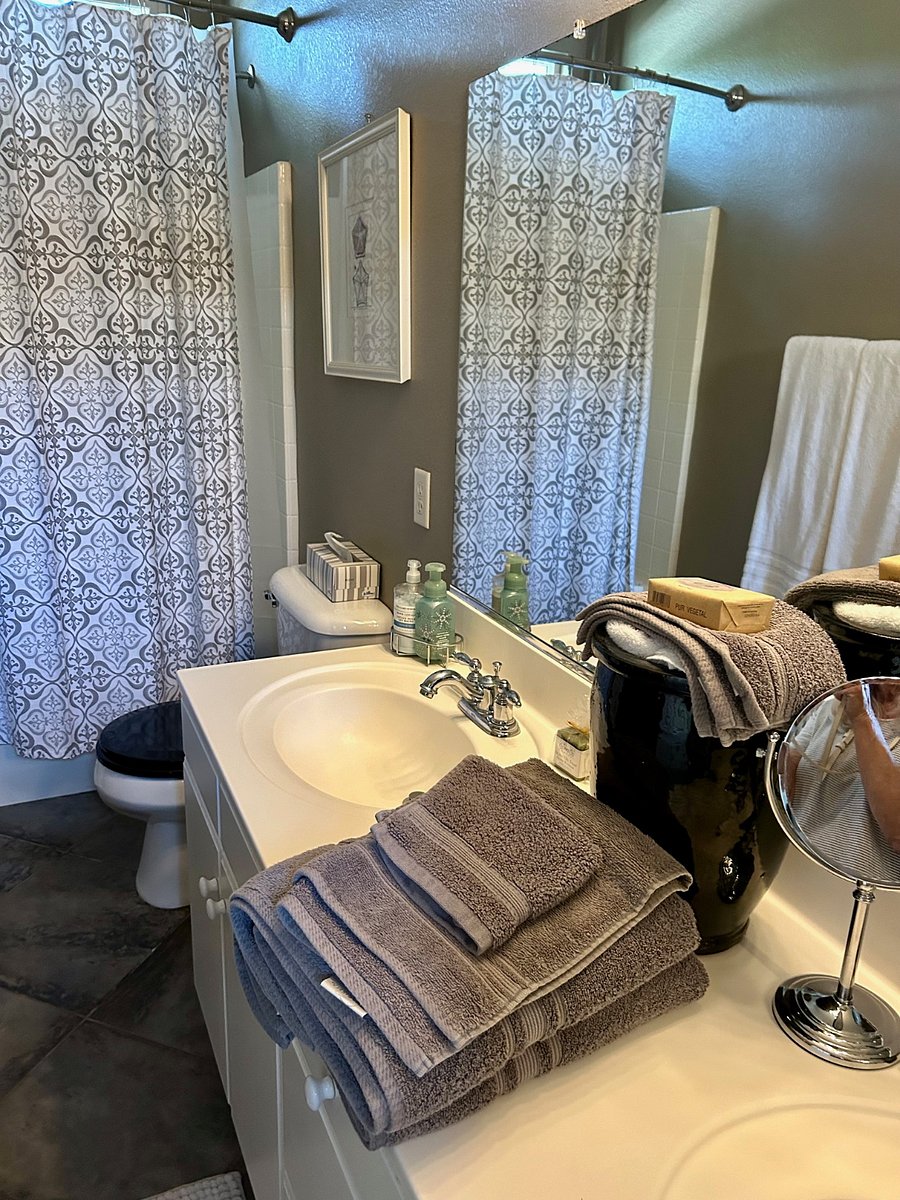 Private bath with tub, shower and two sinks