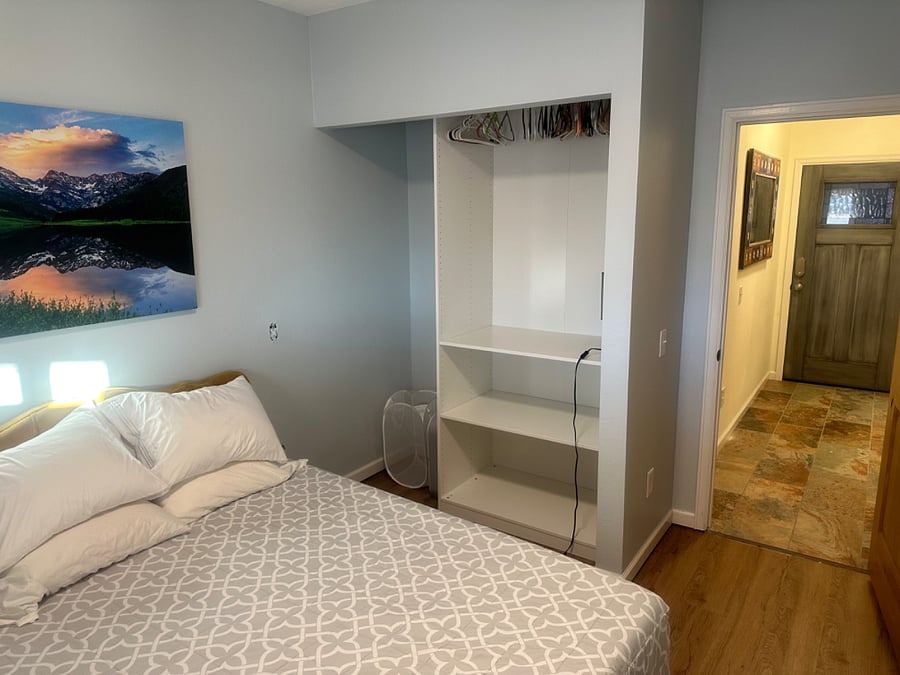 2nd bedroom, you can also see the entrance door for the space from the back yard