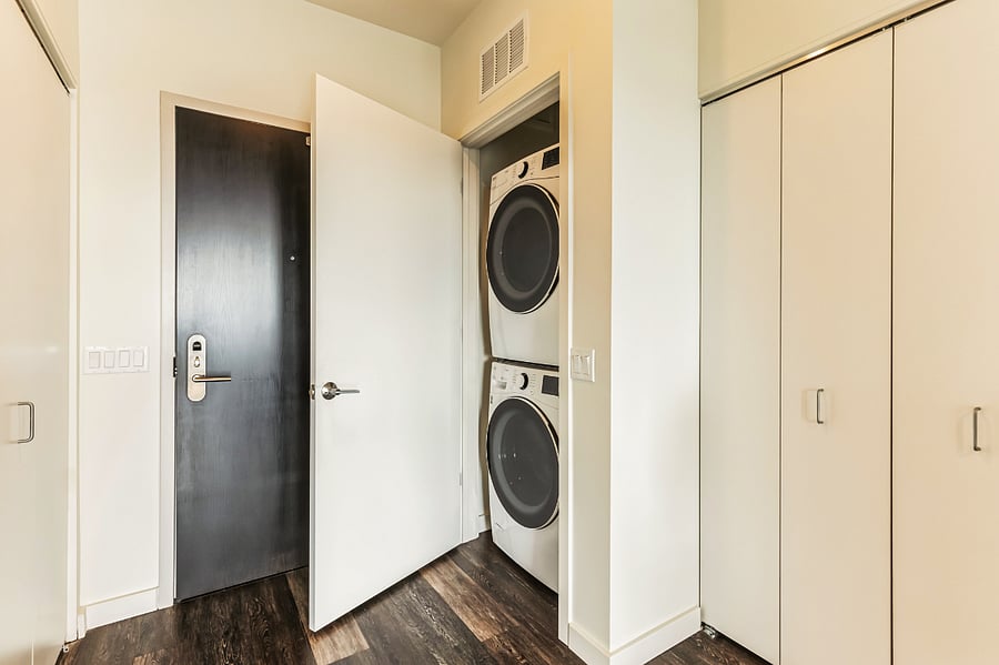 Enjoy the convenience of an in-unit washer and dryer  perfect for extended stays or refreshing your wardrobe after a day exploring Chicago. Thoughtfully tucked away near the entrance for easy access without taking up living space