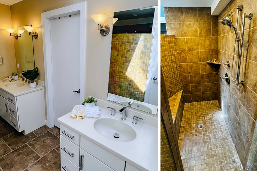Full bathroom, walk in shower, double vanity, separate room for toilet adjacent shower.