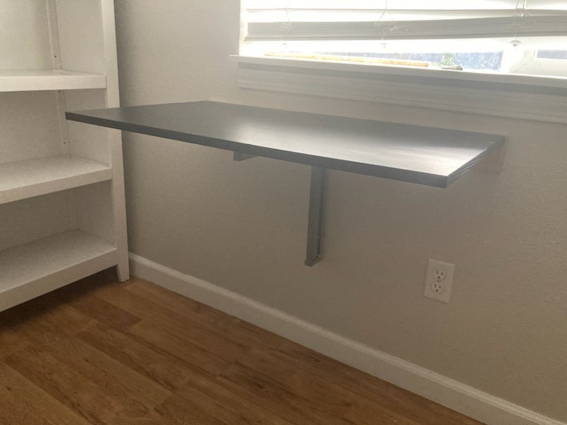 Fold-down wall desk in the bedroom.