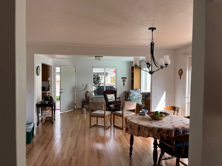 Main home, ground level Dining room, Hutch, Sitting area with Window Seat and Glider chair, Full Kitchen off to the Left