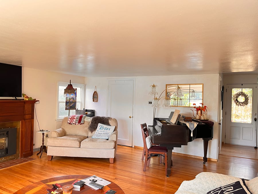 Main home, ground level Living room and view of Loveseat and Baby Grand Piano