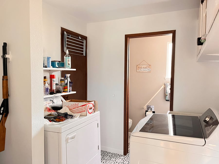 Main home, ground level Laundry room w/Washer & Dryer and Utility Sink and 2 pc Toilet room