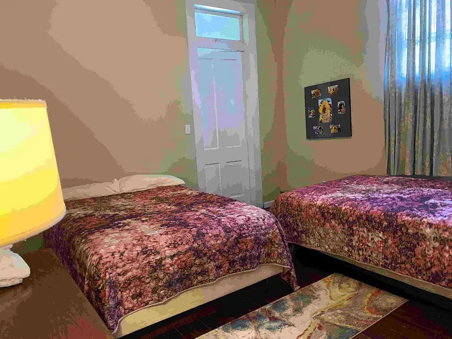 Second Bedroom (Currently has 2 full beds and can be modified to one full bed with terms over 3 months).
