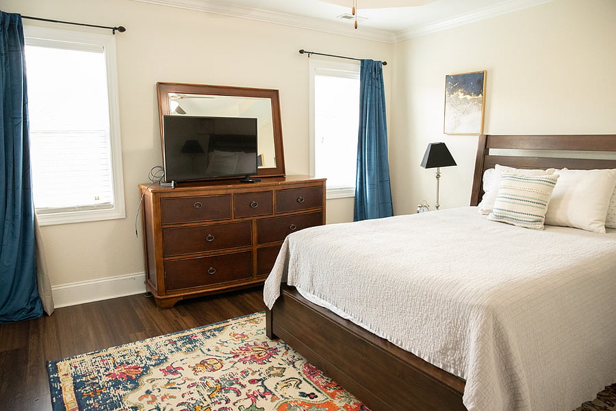 Primary Bedroom - Chest of Drawers + Smart TV, velvet full blackout curtains